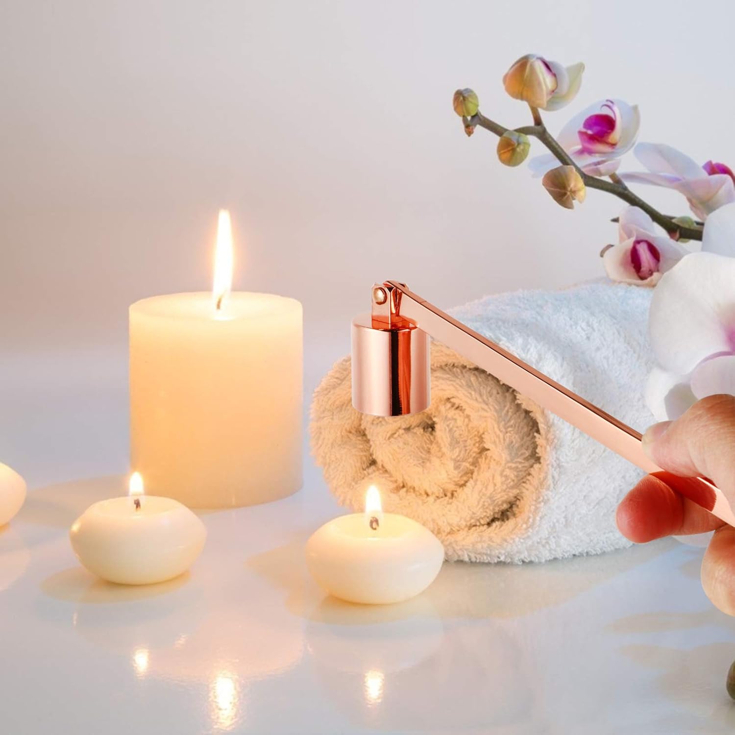Sturdy stainless steel rose gold candle snuffer